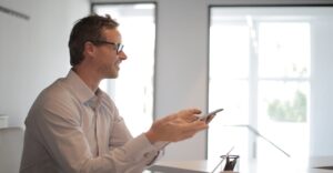 A professional discussing a Nationally Coordinated Criminal History Check dispute, ensuring accuracy in Police Check records and background screening results