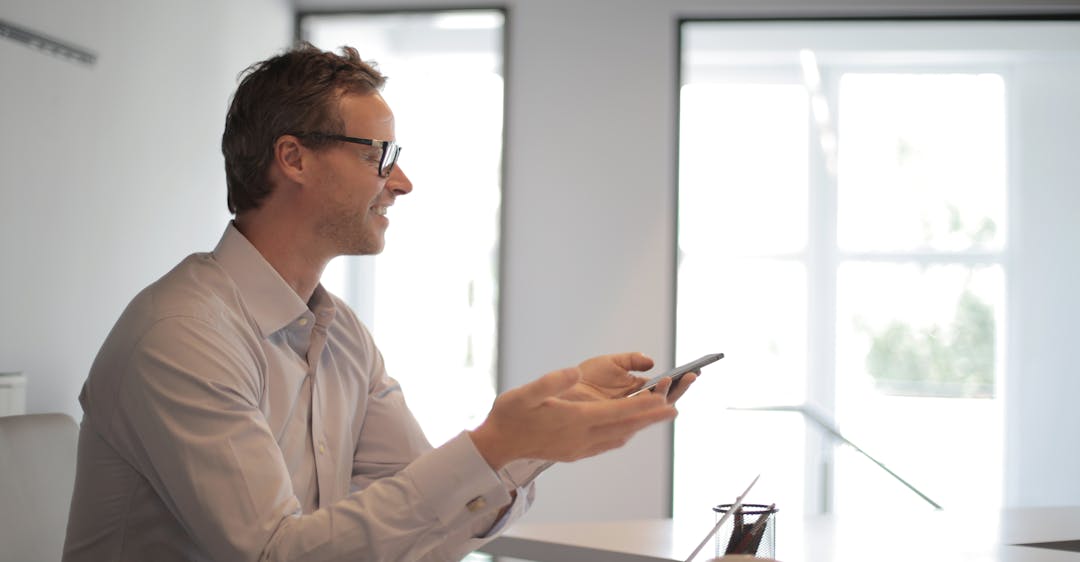 A professional discussing a Nationally Coordinated Criminal History Check dispute, ensuring accuracy in Police Check records and background screening results